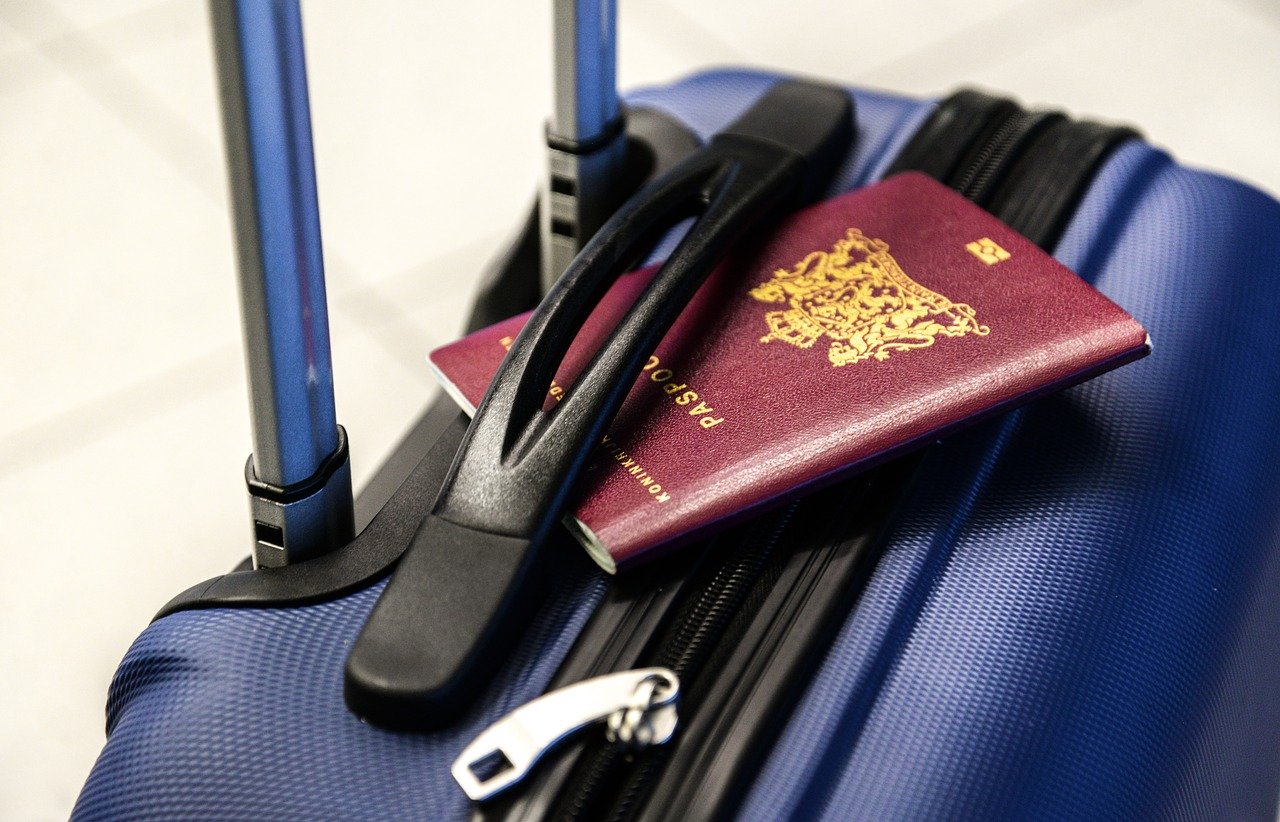 passport on suitcase
